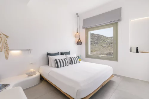 Luxury bedroom with double bed in Mykonos