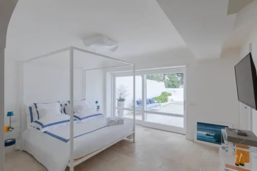 Top bedroom with King bed in villa in Capri